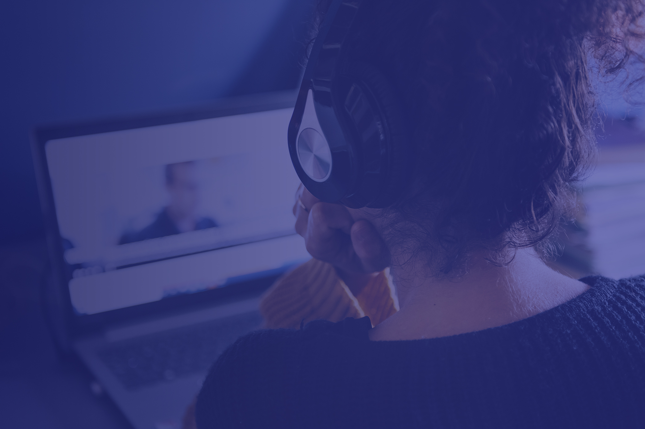 Person watching webinar