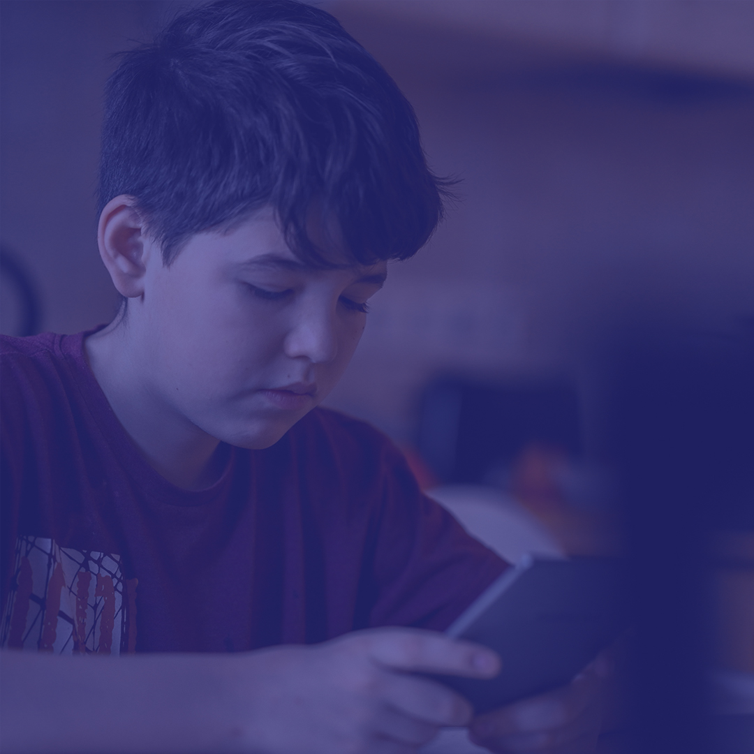 Young boy on digital device