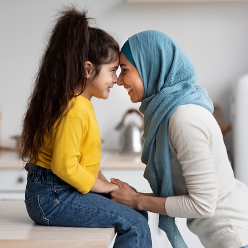 Confident mother and child