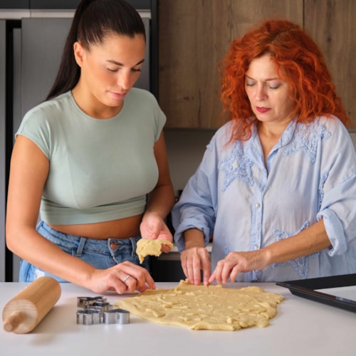 Teenage girl writing on a notepad