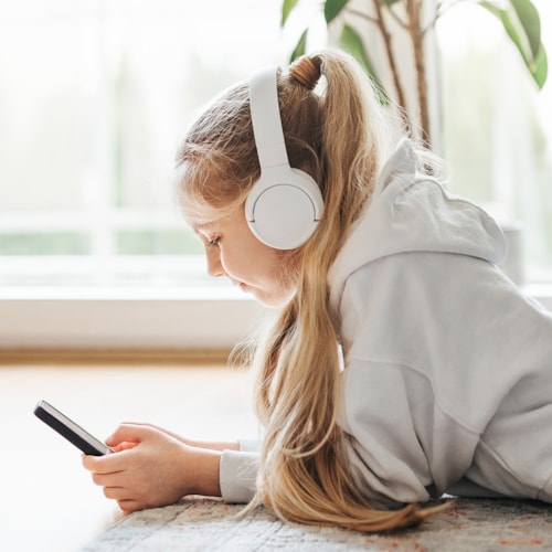Young girls listening to music